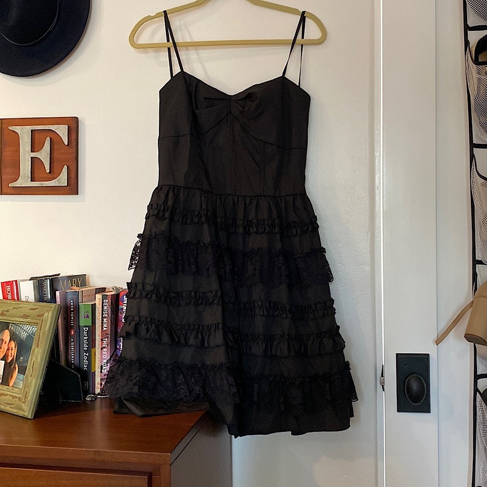 80’s inspired little black dress. Brand new with tags, never worn.